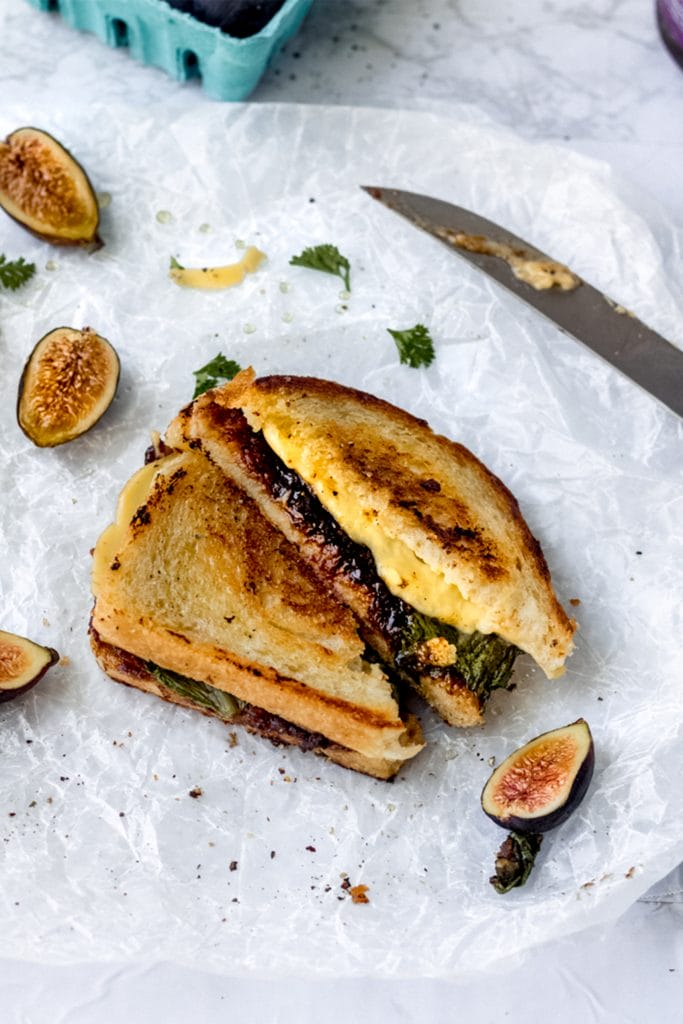 side view of a honey grilled cheese with figs