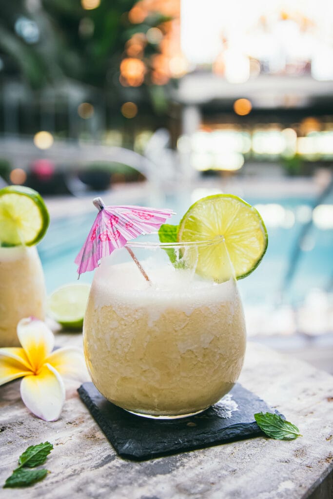 If you like piña coladas...you're going to love such a simple preparation! This piña colada recipe with coconut milk, lime juice, pineapple and rum evokes classic beach-y flavors that are SO refreshing. Ready in just 10 minutes with four ingredients!