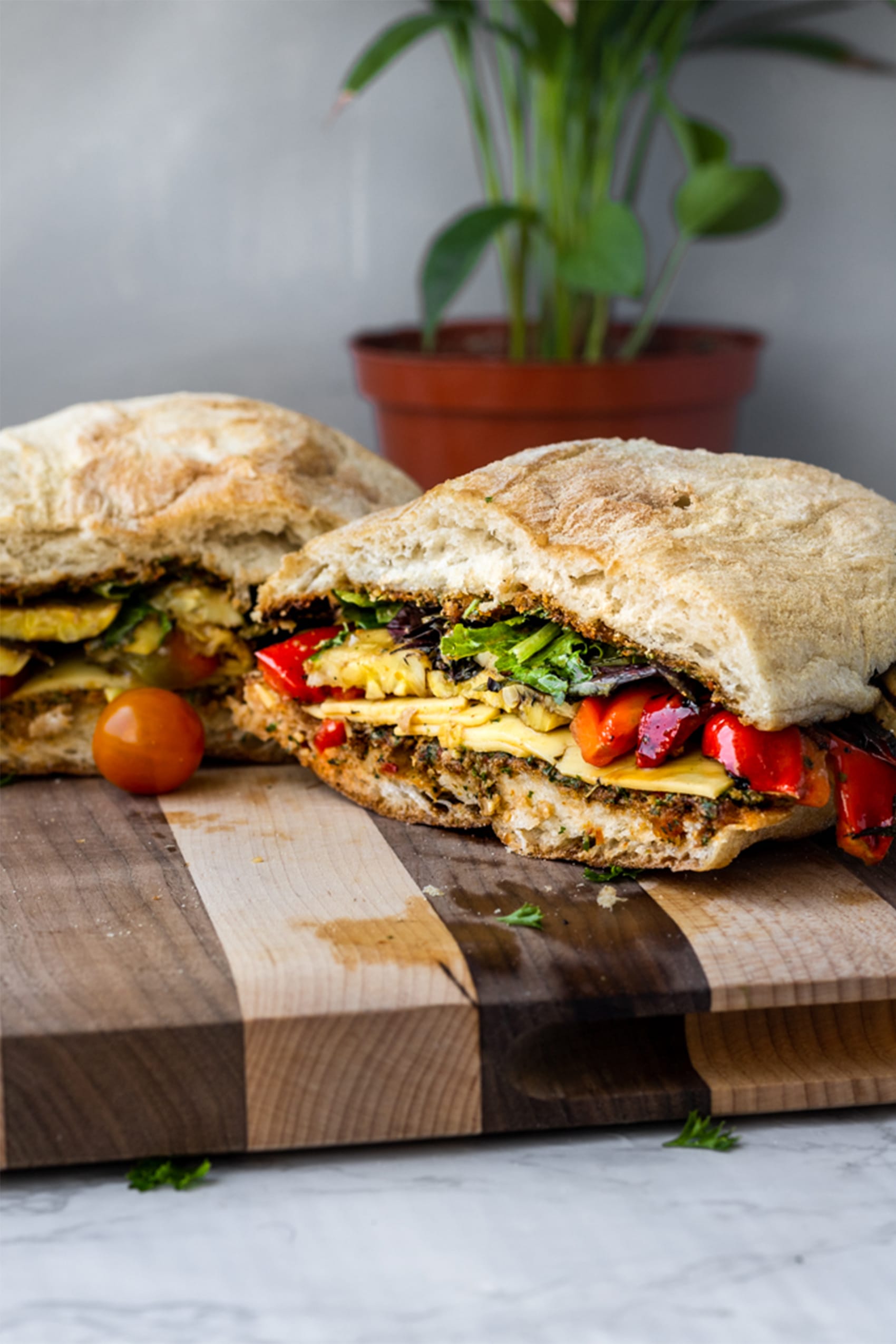 grilled veggie party sub on a wooden board