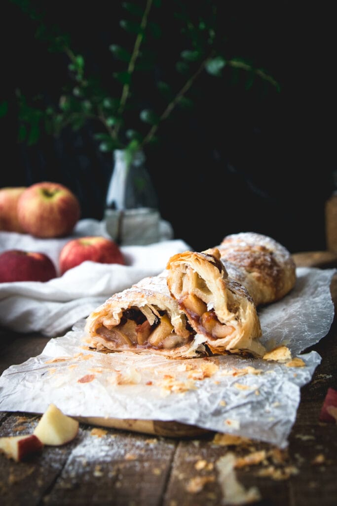 side view of two slices of puff pastry apple strudel