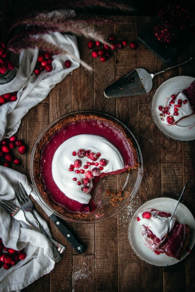 overhead shot of vegan cranberry custard pie with two slices