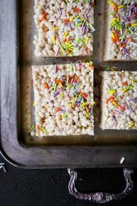 close up of vegna brown butter rice krispie with rainbow spirinkles