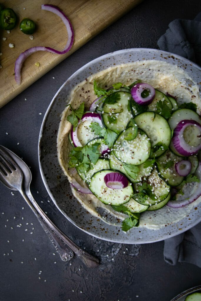 side view of cucumber salad with tahini
