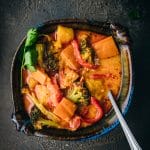overhead shot of a bowl of pumpkin vegetable curry