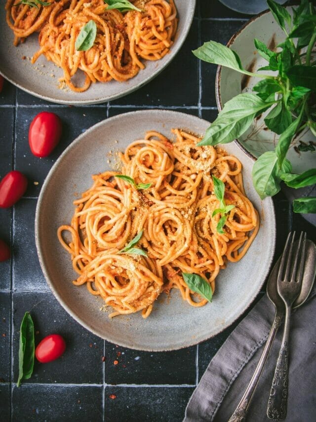 overhead shot of a plate of cherry tomato pasta alla vodka spaghetti