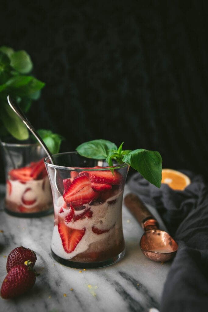 strawberry grand marnier sundae with basil and ice cream