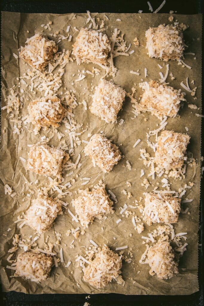tray of coconut crusted tofu piece before baking