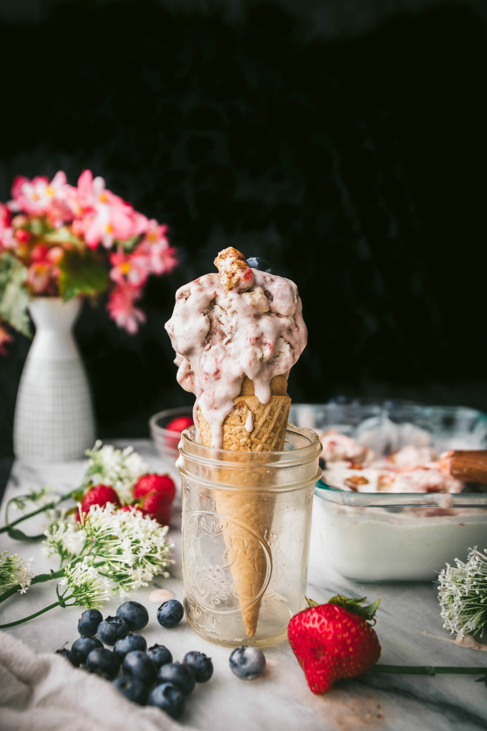 cone of vegan berry ice cream in a glass
