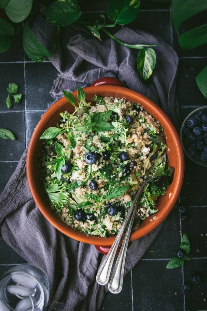 overhead shot of herby quinoa salad with tahini dressing