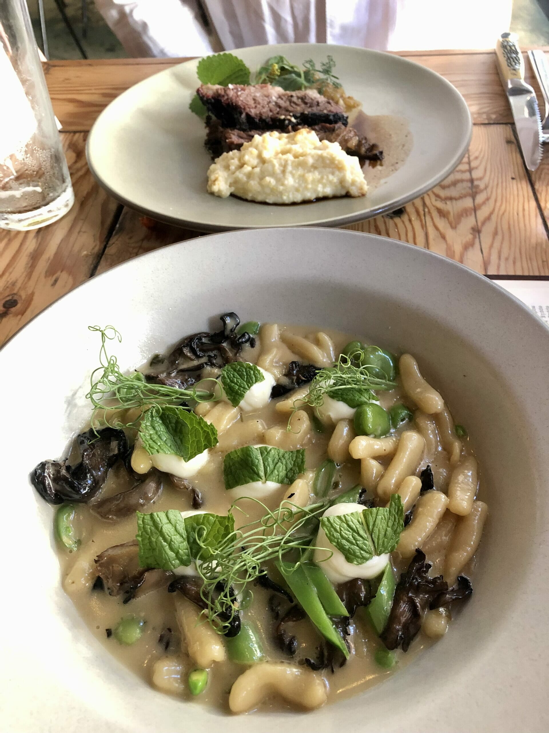 plate of pasta with mushrooms and mint