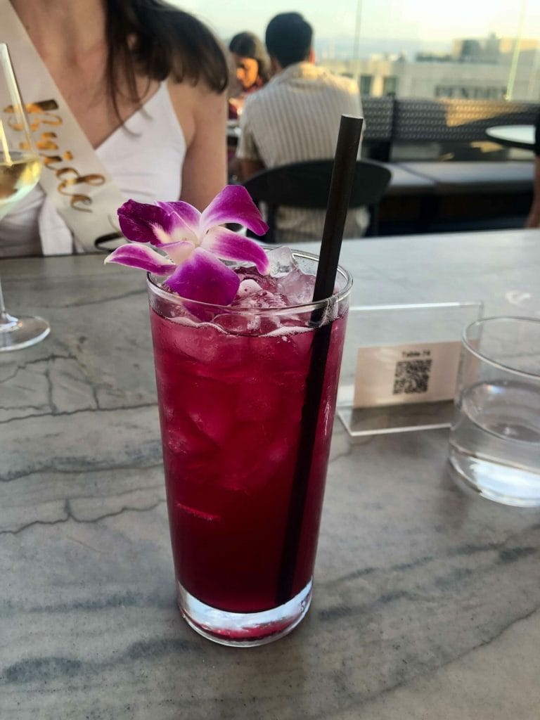 flowered hibiscus cocktail from The Nolen