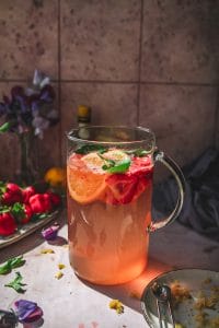 pitcher of strawberry basil garden party coctails