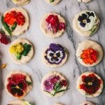close up of edible flowers on shortbread cookies