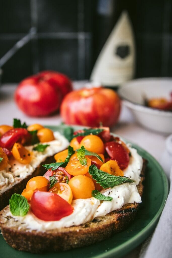 side view of ricotta tomato toast