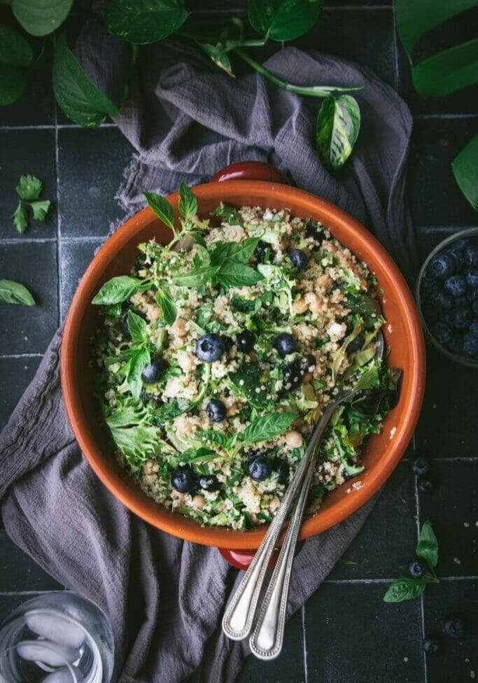 overhead shot of herby quinoa salad with tahini dressing