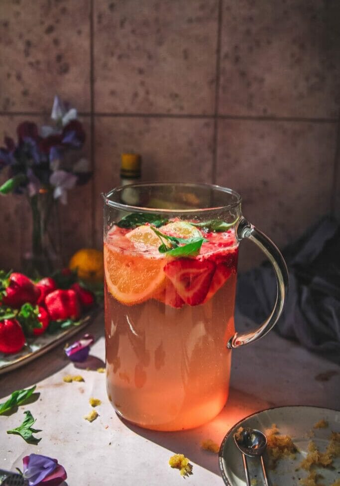 pitcher of strawberry basil garden party coctails
